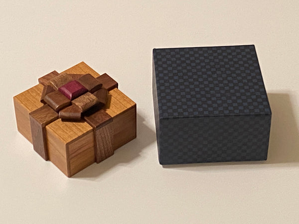 Box with a Ribbon III Puzzle by Akio Kamei – Puzzle Box World