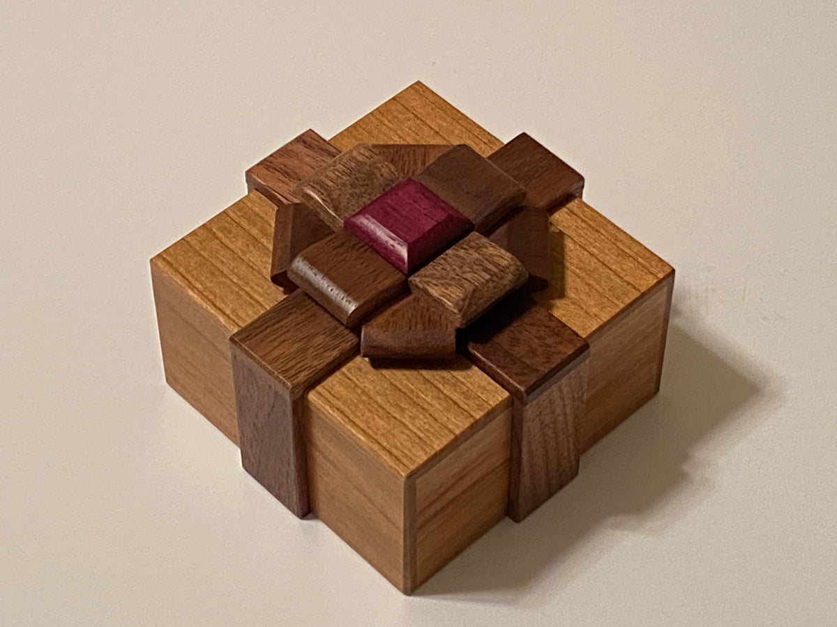 Box With A Ribbon III Puzzle by Akio Kamei